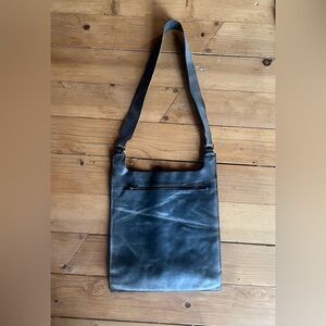 Preowned Allsaints distressed leather messenger bag.